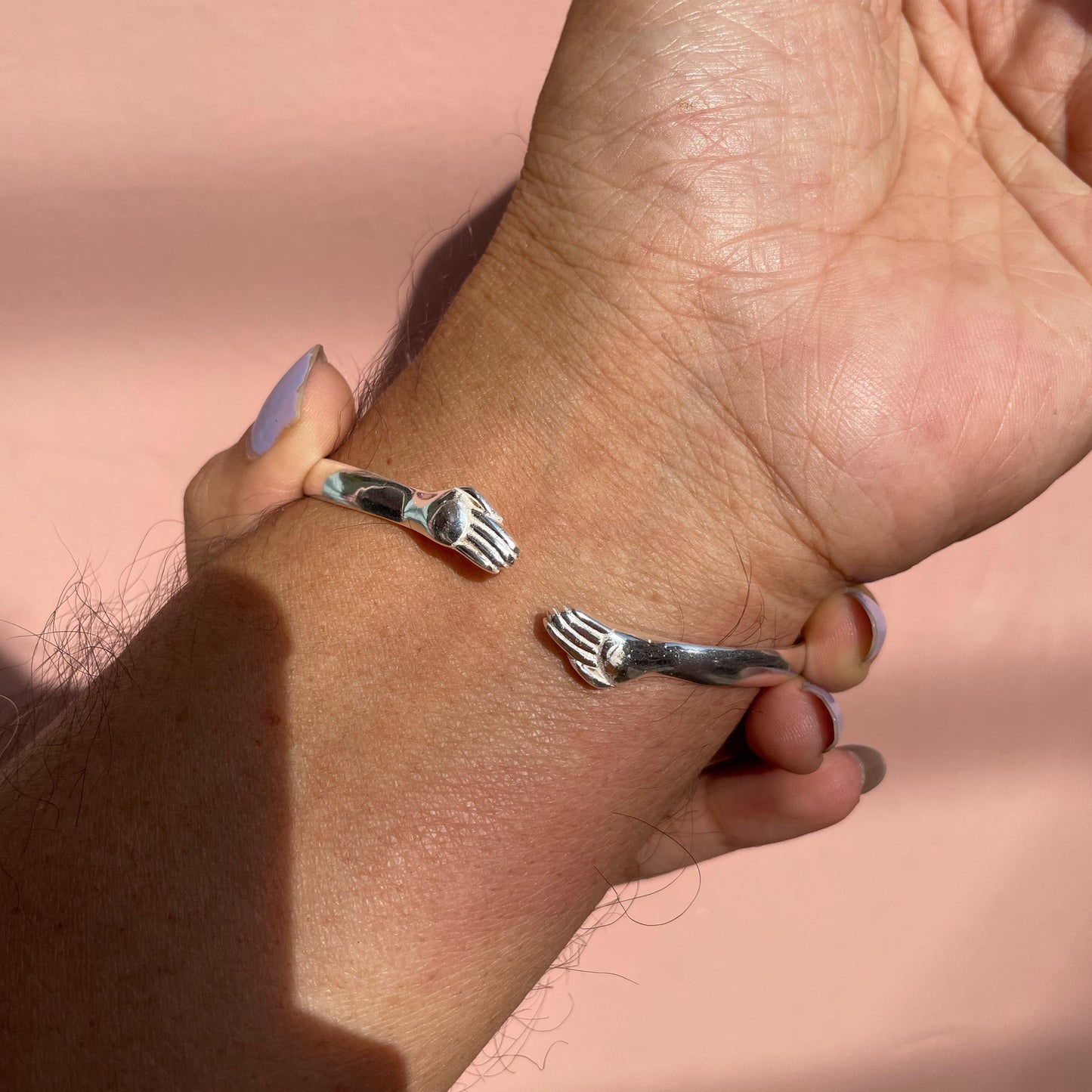 The Embrace – Hugging Hands Engravable Silver Bracelet