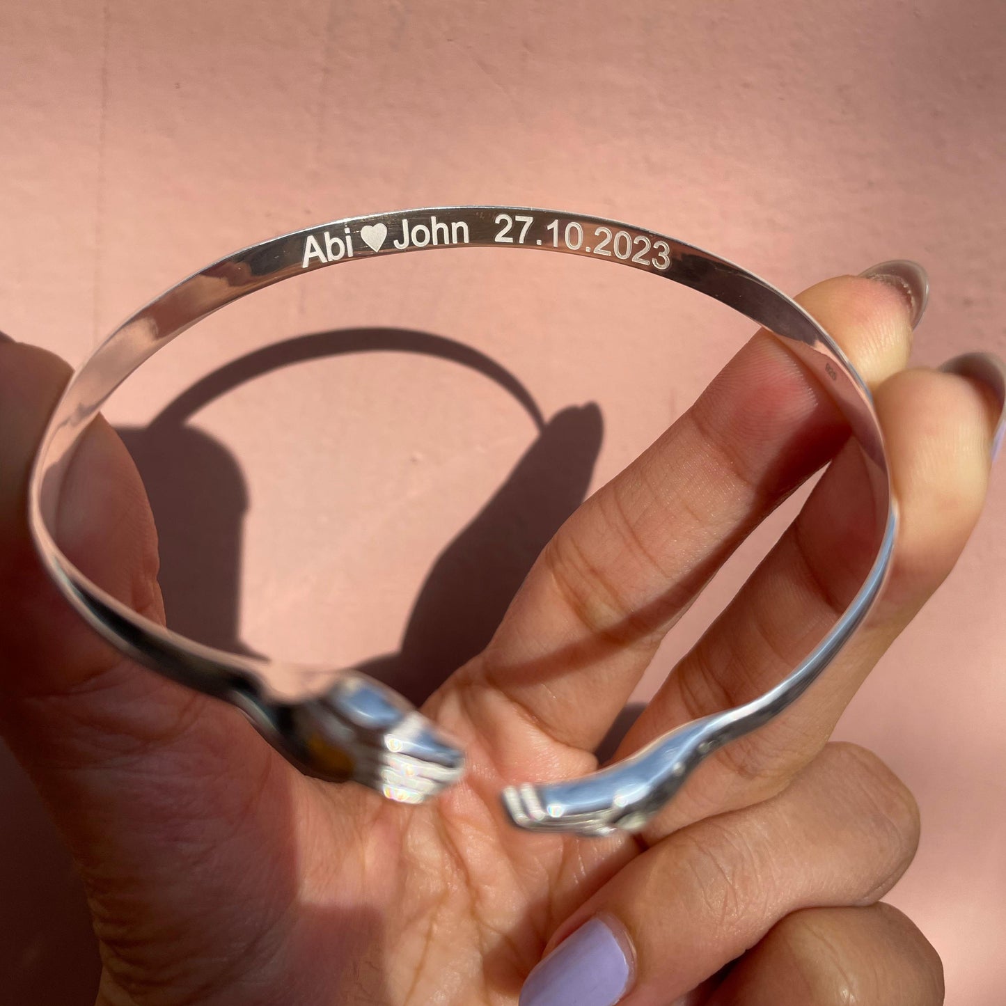 The Embrace – Hugging Hands Engravable Silver Bracelet